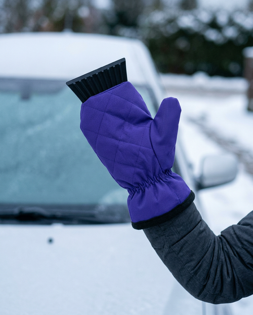 The scraper blade is built into the fleece-lined mitt as one piece