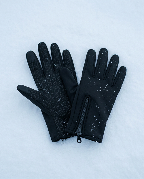 Driving gloves showing textured anti-slip palm and wrist zip